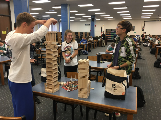 Two students utilize the KEVA planks that the library work-space in their free time. With activities such as this this new work space hopes to give students the space to be creative.