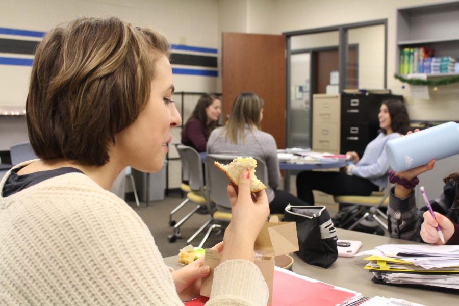 McKenna Kalesz, sophomore, eats an egg salad sandwich from the school cafeteria. This is just one of the vegetarian options students can find for lunch at the school.
