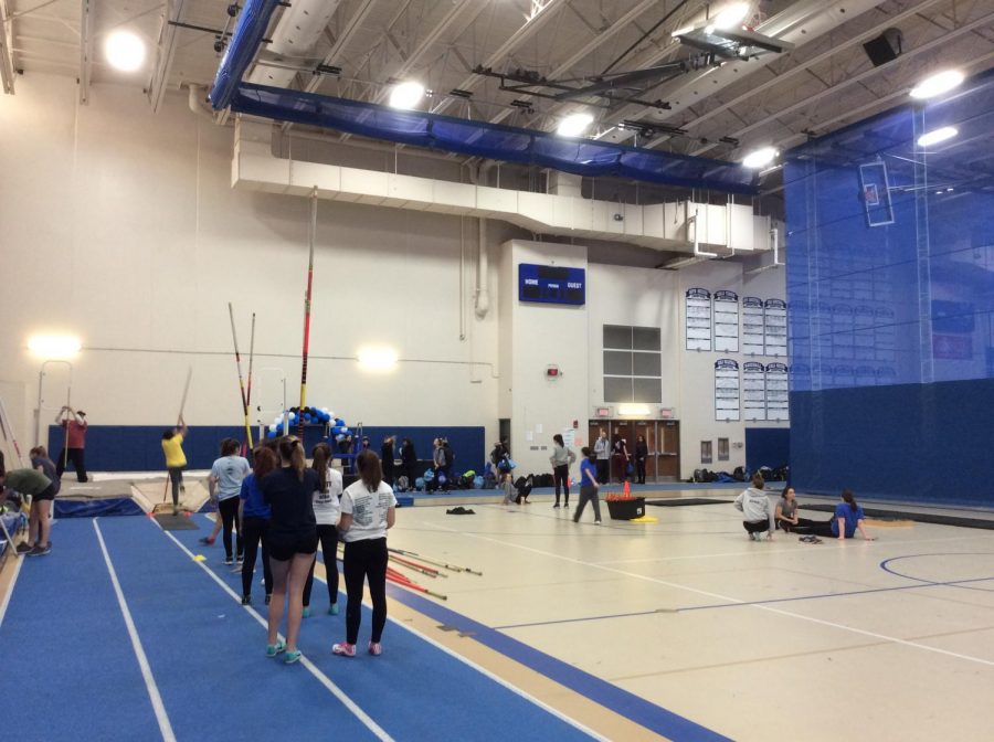 Girls track members practice together after school. The indoor season is a huge component in preparing for the outdoor season, according to Kauffman.