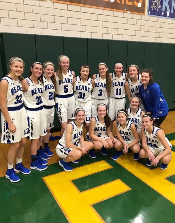 The girls basketball team poses after a game at Fremd earlier this season. The team now enters the postseason on an 8-2 run and will face Buffalo Grove on Tuesday.