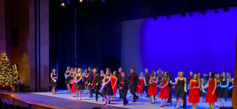 Blue Notes and Bare Voices perform a holiday song together during last Decembers concert. The group will meet up onstage again this Thursday with a new concert theme.