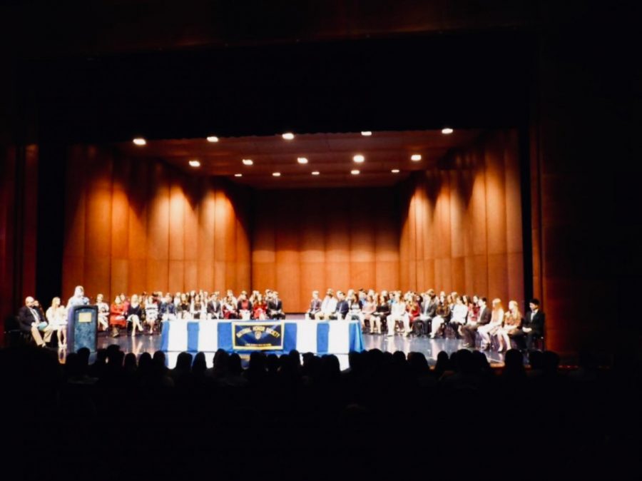 Students are initiated into NHS at the induction in March 2017. For the 2019-2020 induction, 92 students will be on stage for the ceremony, ready to be inducted into NHS.