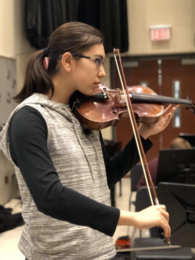 Olivia Reiff, senior, practices her solo piece for the upcoming Solo & Ensemble competition. Student musicians like Reiff have been preparing for months in order to have the best shot at going to the honors recital in April.