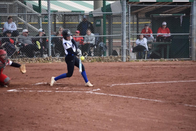 Elizabeth Chialdikas, junior, makes contact with a pitch during a game in Tennessee last week. The team went 1-4 during the trip