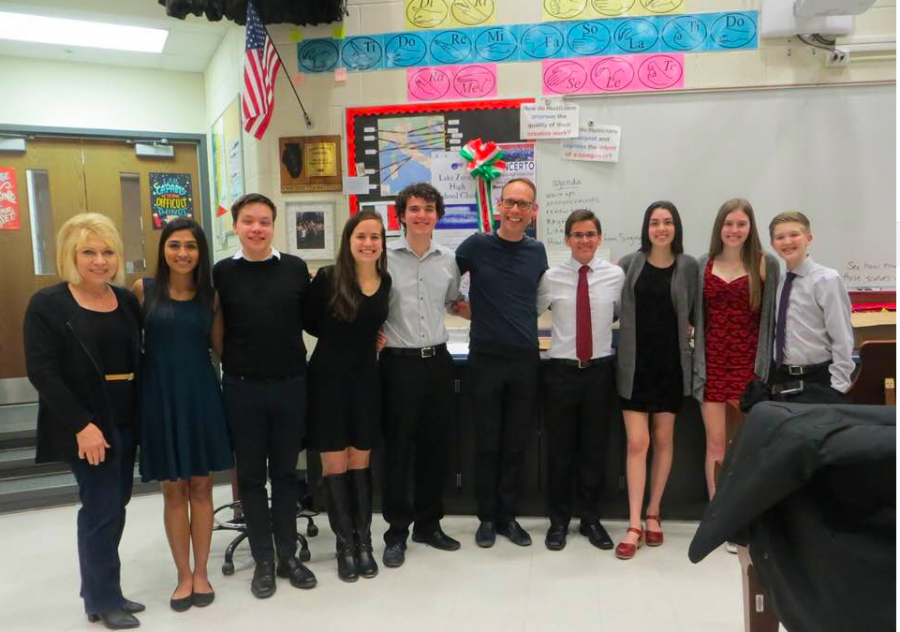 Chris Misik, private voice teacher, and Nick Juknelis, choir director, pose with some of the honors recital participants from choir. Students such as these ones had the opportunity to showcase their talents on Tuesday night at an elite recital.
Not pictured: Choir performers Teah Mirabelli, Nicholas Lemperis, and Calista Brown.