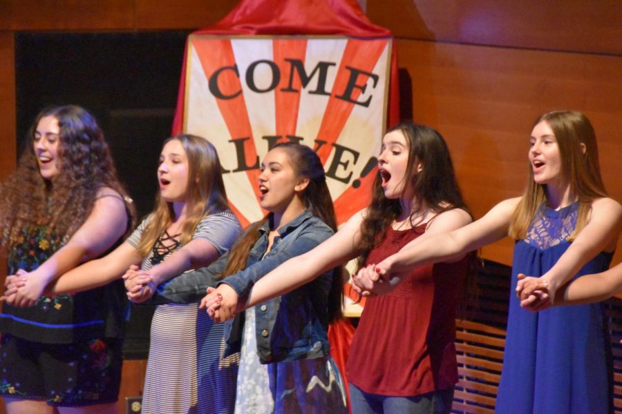 Members of Kalideoscope perform a finale together at the end of the show. Everyone spends a different amount of time practicing their songs, Matthew Shaw, freshman, said. It just depends on what you need.