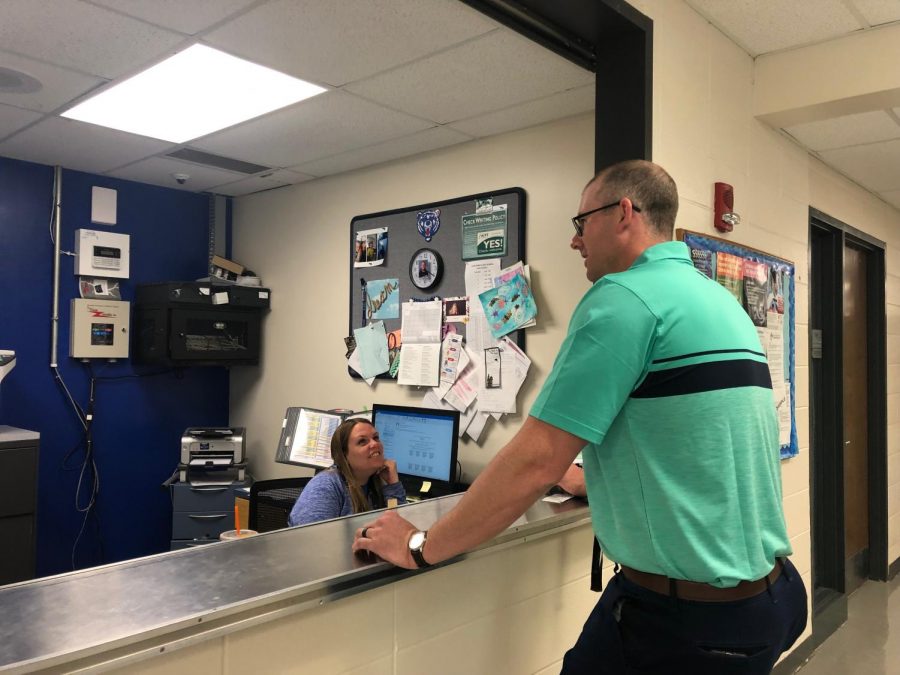 Jeretina stops by the bookkeepers office as he checks in on all the staff in the morning. Along with the teachers in the building, he will also email the online teachers just to see how things are going, and if there’s any questions or concerns from students or parents.