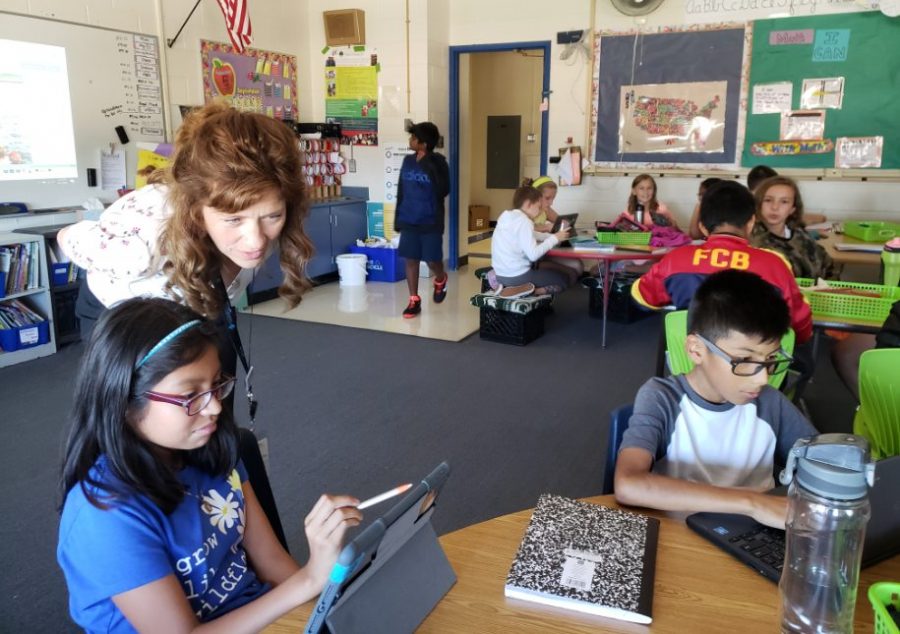 Kelley Gallt, superintendent, visits a D95 classroom. Gallt says she began in education as a teacher before gradually rising to the demanding but exciting position of superintendent.