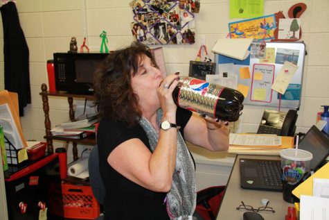 Elisabeth Siedentop-Wing, special education teacher, shows off her favorite Pepsi product: Diet Pepsi cherry. Siedentop_Wing says Pepsi breaks are her happy place during the sometimes stressful school days.