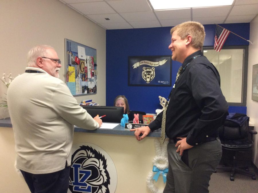 Principal Bo Vossel, right, submitted his resignation in November for undisclosed reasons. An interim principal, who was approved by the Board of Education last week, will fulfill the vacancy starting this month. 