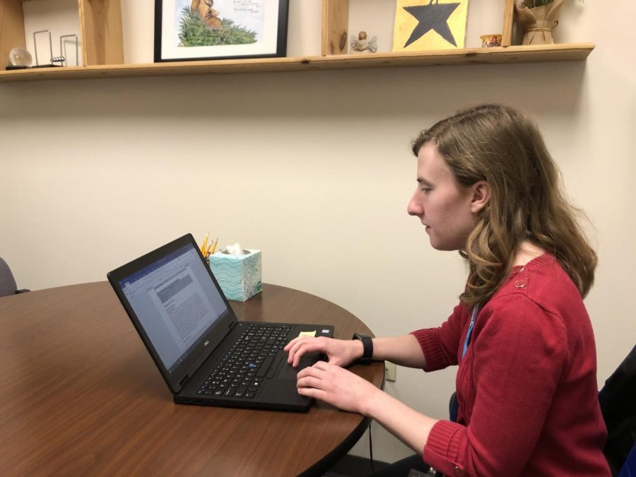 Jennifer Hilger, school psychologist works on her laptop in her office. At the High School her job revolves around helping students to their specific needs. 