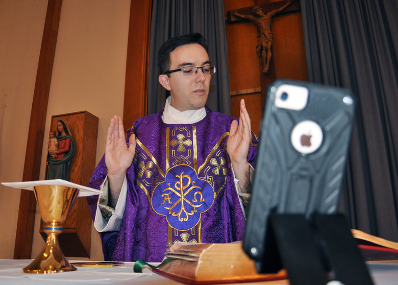 Priest broadcasts mass through cell phone. For many religious people. these virtual gatherings have been a source of comfort and normalcy.