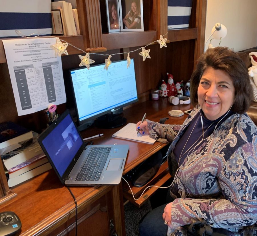 Rose Weismann, literacy resource center aide, working at her home office. In the past few months, she says she has been "busier now than ever" as she helps students navigate the difficulties of digital learning.