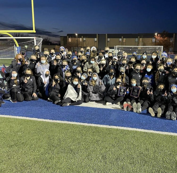 The Girls Track and Field team after their first meet and win against Lakes, Grayslake Central and Grayslake North. Despite the unconventional season, girls track and field, among other sports are finding ways to have a great season.