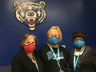(From left to right), Paula Giese, Helen Rzasa, and Pollie Greenhalgh. The secretaries help with a variety of jobs in the main office, keeping everything under control.