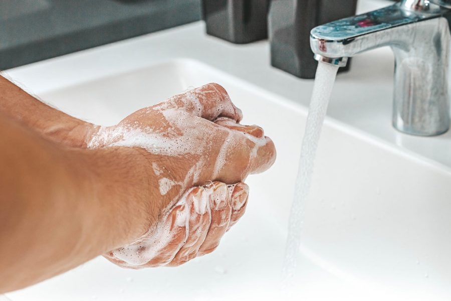 Hand washing combats colds and other illnesses by killing germs.