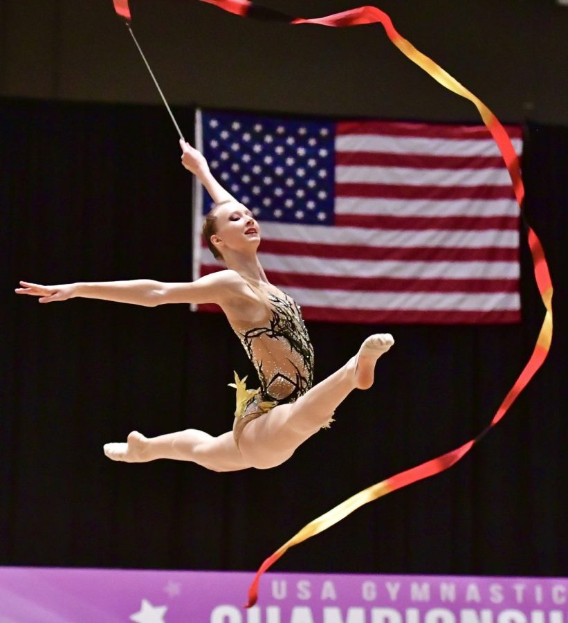 Alexandra Bryukhova, sophomore, competing with her ribbon at Nationals 2022. Bryukhova has been a rhythmic gymnast since she was 5 years old. 