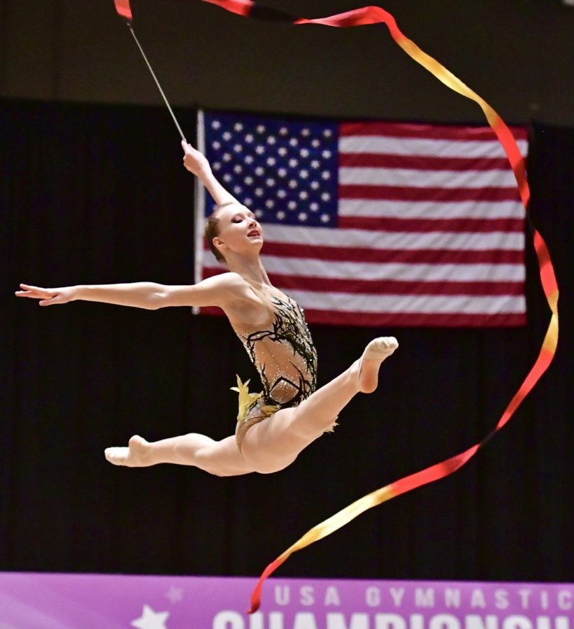 Alexandra+Bryukhova%2C+sophomore%2C+competing+with+her+ribbon+at+Nationals+2022.+Bryukhova+has+been+a+rhythmic+gymnast+since+she+was+5+years+old.+