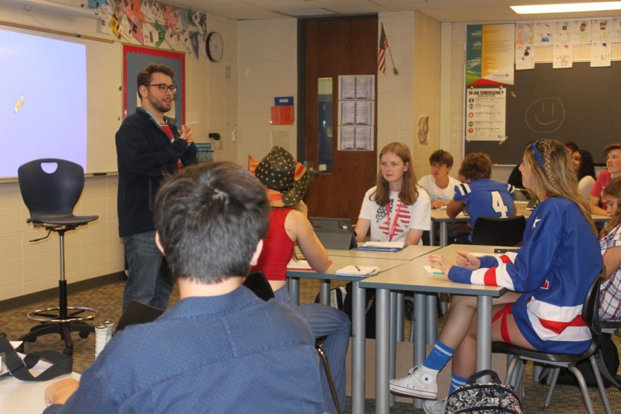 Joseph Ellery, math teacher, teaches his 6th period Honors Pre-Calculus class maximization word problems. Ellery says his favorite part of teaching is interacting with students. 