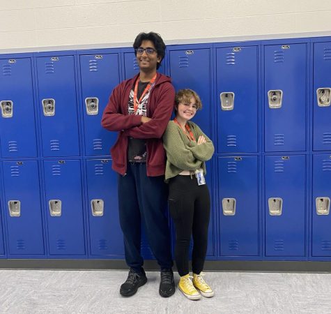 Cibi Vadivel, sophomore, (left) stands next to Audrey Hilker, sophomore, (right).  Their drastic physical gap cause a difference in their experiences. 