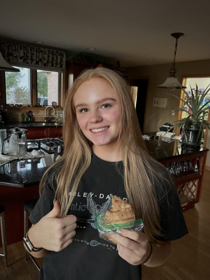 Lilly Clifford, junior, shows one of her healthy recipes-grilled meat.