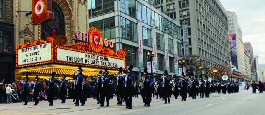 The LZHS Marching Band preforming “The Imperial March” on State Street. The Chicago Thanksgiving Day Parade featured bands from 18 other schools and universities as well as performances by numerous other groups. (Photo by Ayaan Hamid)