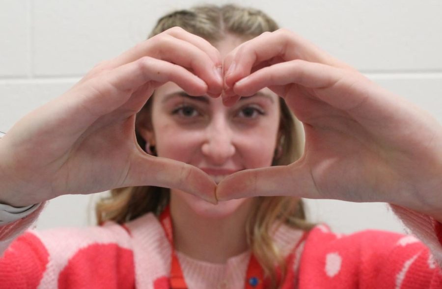 Alexandra Goldenstein, sophomore, makes a heart to represent her personality. Goldenstein is an ENTP, which is also known as a caregiver. 