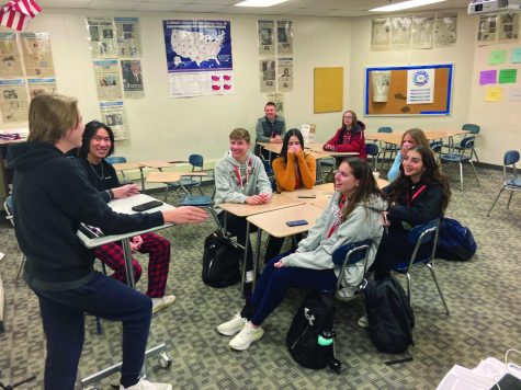 The Political Science club discusses and debates current events at one of their meetings. Political science club is one of the many current event focused clubs at LZHS, along with REACT club and International Club. 