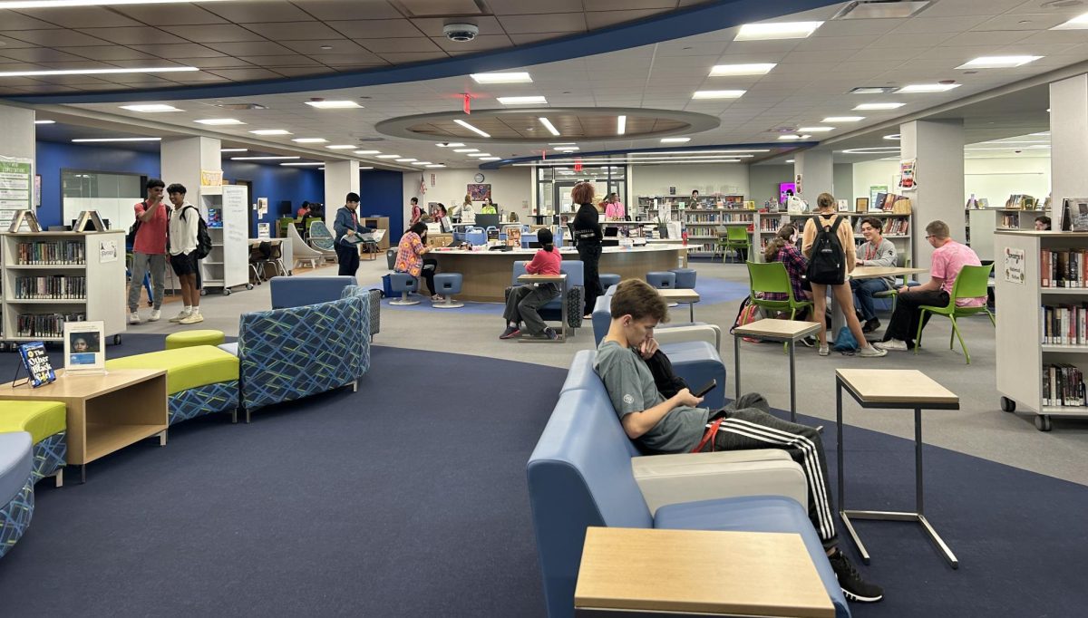 Students gather in the Learning and Innovation Hub for office hours. As a quieter space, the Hub gives students a good environment for studying and homework.