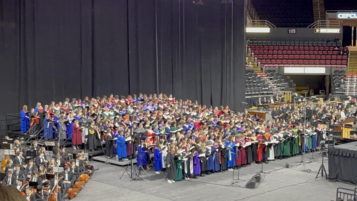 The+ILMEA+All-State+Choir+performs+one+of+their+songs.+Tyson+had+the+opportunity+to+see+their+performance%2C+and+was+moved+by+their+passion+for+it.