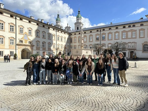 Choir members pose outside The Dom in Salzburg, Austria. They visited several historical sights on their trip.
