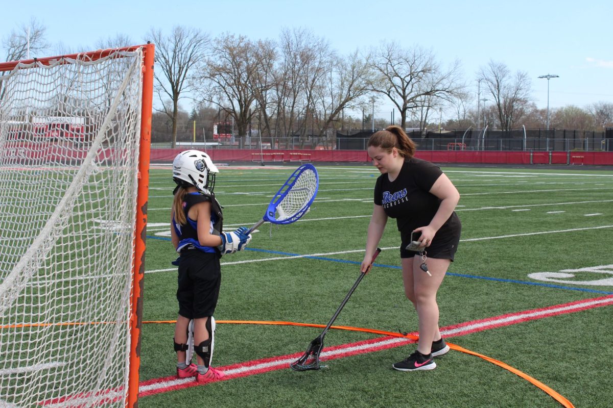 Student-athletes play it forward