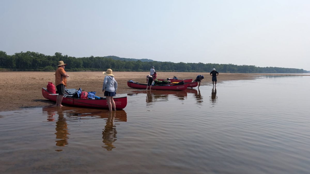 Canoes docked on the sandbar located on the Wisconsin River.