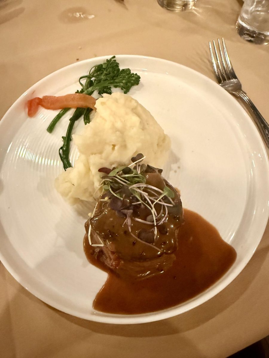 Mini Chateaubriand au Poivre, which was a 6 oz filet wrapped with pancetta (Italian salt-cured pork belly), accompanied by mashed potatoes and black peppercorn sauce.  Photo by Olivia Slawny