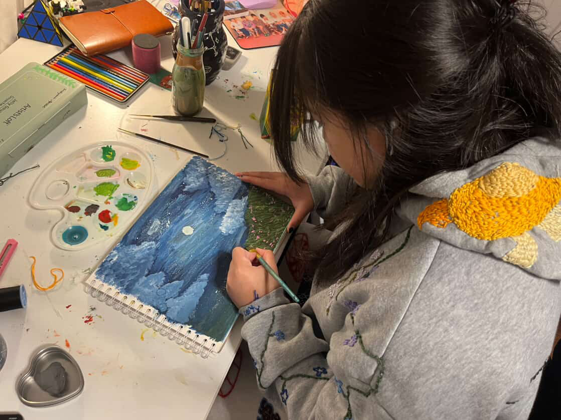 Kristyanna Apostol hard at work on an art piece. Apostol, among many others, work on art both for school and on their own time.